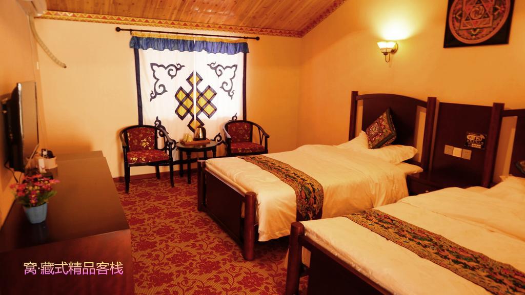 Wo Home Hostel Jiuzhaigou Rum bild