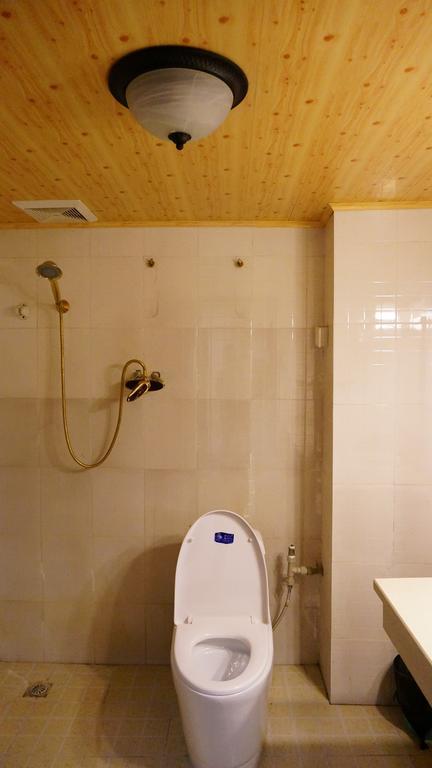 Wo Home Hostel Jiuzhaigou Rum bild