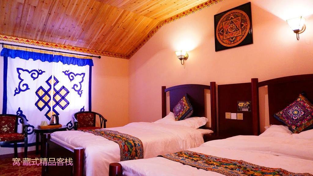 Wo Home Hostel Jiuzhaigou Rum bild