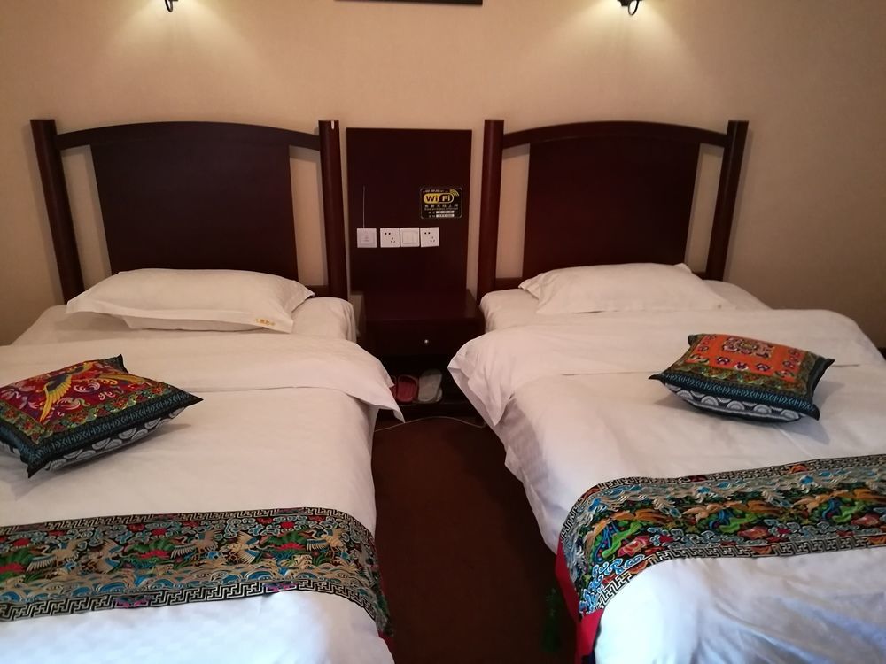 Wo Home Hostel Jiuzhaigou Exteriör bild